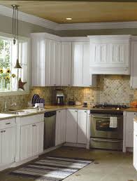 A rustic kitchen with oak cabinetry can be enhanced by the ambient lighting. Country Kitchen Tile Floors With Oak Cabinets From Kitchen Tile Floors With Oak Cabinets Pictures
