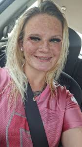 Can someone edit a photo to remove the seatbelt and change the background  to white?