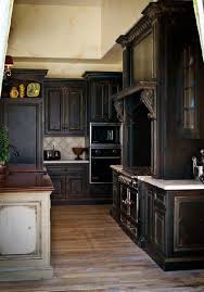 While many of us will never have a $100,000 dream kitchen,. Home Decor And Design Photos Home Decor And Design Pics Black Kitchen Cabinets Kitchen Cabinet Colors Black Cabinets