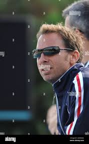 Coach of Alain Bernard, Denis Auguin of France reacts after winning the  men's 100m freestyle final at the European Swimming Championships in  Eindhoven March 22, 2008. Bernard broke the men's 100m freestyle