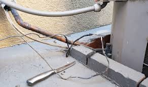 Even in 2019 with all of the wireless devices that are available, it's important to understand what low voltage wires you should be running when building a new home. Protecting The Low Voltage Wires To The Ac On A Central Air Conditioner Red Deer Heating Ac