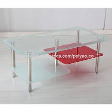 An elegant 2 tiered coffee table with a glass top to show off the décor underneath. China New Design 3 Tier Glass Coffee Table High Quality And Competitive Price On Global Sources Coffee Table Set 3 Tier Glass Coffee Tables Glass Oval Coffee Table