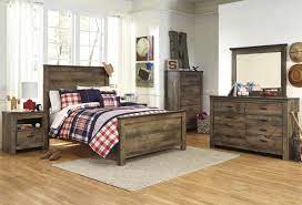 Find the perfect home furnishings at hayneedle, where you can buy online while you explore our room designs and curated looks for tips, ideas & inspiration to help you along the way. Trinell 4 Piece Panel Bedroom Set In Warm Rustic Oak