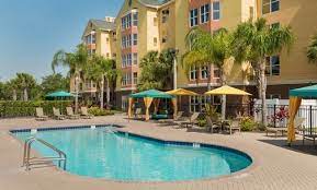 Homewood Suites By Hilton Orlando Nearest To Univ Studios Hotel Fl Outdoor Pool Area Orlando Hotel Universal Studio Orlando Hotels Homewood Suites