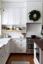 Diy How To Make A Dried Orange Garland And Brass Bell Garland The Grit And Polish Kitchen Inspirations Kitchen Remodel Home Kitchens