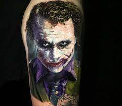 Joker in shades of grey on the arm. Joker Tattoo By Chris Showstoppr Post 26647 Joker Tattoo Joker Tattoo Design Joker Face Tattoo