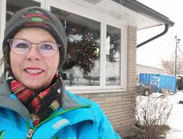 Clearing snow from top of Tempo before rain