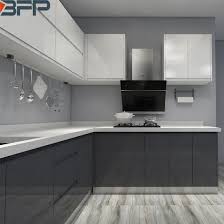 Using rich yellow for the cabinets along the wall provides a contemporary vibe and makes a perfect frame for the white and gray wall. China Australian Black High Gloss Lacquer Kitchen Cabinet With Modern Design China Furniture Home Furniture