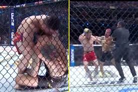 Merab Dvalishvili kisses Sean O’Malley during UFC 306 title fight