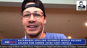 Cory Hepola talks to backwards spelling Guinness World Record holder Pam  Onnen of Hastings