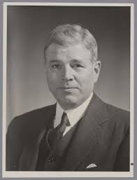 Karl Taylor Compton, William Lyman Campbell, Arthur Calbraith Dorrance and  George Russell Harrison with model of Building 16, 1950
