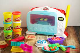 They love baking and cooking up their own meals with this set and enjoy proudly serving their creations. Play Doh Kitchen Creations Magical Oven Frugal Mom Eh