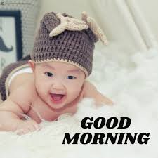 Looking at camera over white background. Download 70 Cute Good Morning Baby Images