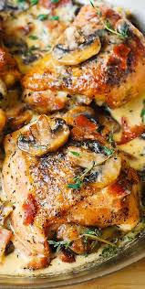 Chicken Thighs With Creamy Bacon Mushroom Thyme Sauce Comfort Food Chicken Free Chicken Recipes Chicken Recipes