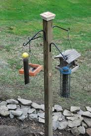 Diy Bird Feeder Pole System Install A Post For Feeding The Birds Matt And Shari Bird Feeding Station Bird Feeder Station Hanging Bird Feeders