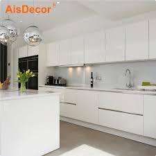 The high glossy kitchen cabinets, such as glossy uv , acrylic kitchen cabinets are very popular these years ,we are producing lots now. Australia Apartment Contemporary Style High Gloss White Lacquer Plywood Kitchen Cabinets China Kitchen Cabinets Kitchen Cabinet Made In China Com