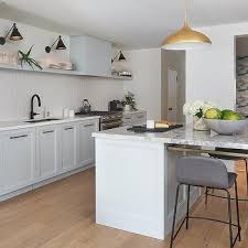 Find beautiful blue kitchen ideas, including blue kitchen cabinets, blue kitchen islands, blue and white kitchens, and blue backsplash ideas. Floor To Ceiling Light Blue Kitchen Cabinets With Brass Pulls Transitional Kitchen