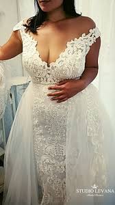 Plus Size Wedding Gown With Stunning Lace And Tulle Overskirt Adel Studio Levana Wedding Dresses Wedding Dresses Plus Size Stunning Bridesmaid Dresses