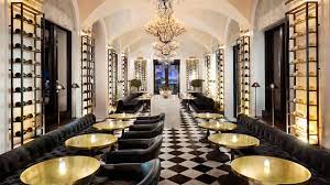 Restoration hardware furniture and light fixtures, a wall with a picture of tuscany, full license with a 150 capacity. Rh Rooftop Restaurant West Palm West Palm Beach Fl Opentable