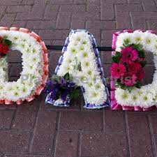 Deliver proflowers® flowers, plants & gifts to your loved ones! Dad Wreath Made In Rainbow Coloured Flowers Funeral Flowers Canvey