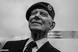 Normany veteran Eddie Linton laughs as he gets ready to pose for a... News  Photo