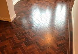Learn how to choose the best vinyl flooring for your home with this popular types of vinyl flooring include plank, sheet and peel and stick. Luxury Vinyl Tile Karndean Art Select Spanish Cherry Parquet In Herringbone Design With Gold Tramline Feature Compressed Floormaster