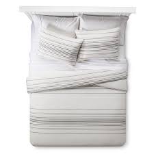 Comfortable bedding with attractive pattern based on black. Threshold White Embroidered Stripe Comforter Set