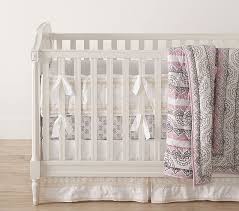 Our harper bedding showcases simple stripes and grosgrain appliqués on a white ground. Pottery Barn Baby Bedding