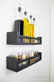 This wooden spice rack is both practical and decorative, and brings a warm, personal touch to an empty wall in your kitchen. Diy Rustic Wall Mounted Spice Rack The Inspired Hive