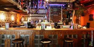 At the bar on the ground floor, the atmosphere is that of a pub. Le N Importe Quoi Bar Nuit Parisienne Cave