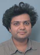 Optimal Rate-Reliability-Delay Tradeoff in Networks with Composite Links