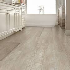 Installing floating vinyl plank floors over our existing tiled floor was definitely the right decision for our bathroom home improvement project. Lifeproof Is The Latest Innovation In Vinyl Flooring Available Exclusively At The Home Depo Luxury Vinyl Tile Lifeproof Vinyl Flooring Vinyl Flooring Bathroom