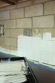 Natural stone tile, such as slate, requires a latex paint designed for masonry and stucco_._ standard interior acrylic latex paint also works well, provided the glazed tiles, like the ones used on bathroom walls and kitchen backsplashes, are different than natural stone tiles. How To Paint A Tile Backsplash Painting Kitchen Tiles Painting Tile Backsplash Beadboard Backsplash