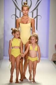 The clip presents the latest trends in fashionable children's swimwear in 2020, as well as other beachwear for children. Fashion Brand Sparks Controversy By Hiring Tiny Child Models To Walk The Runway In Bikinis