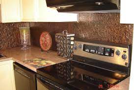 Vinyl adhesive backsplash | being mrs mcintosh. Pin On Faux Tin Backsplashes