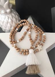 Boho Necklace Necklace In Wooden Beads Natural And White Beige Large Pompom Degrade Of Beige Beige Necklaces Pretty Necklaces Boho Necklace