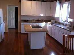 white cabinets (wood flooring, kitchen