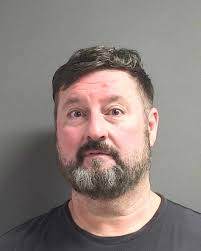 The former co-owner of an Orange City karate studio has been arrested