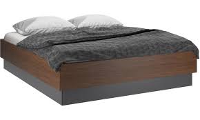 Some of our storage beds have bookcases and shelving units built into the frame. Storage Beds Lugano Storage Bed With Lift Up Frame And Slats Excl Mattress Modern Bed Mattress Storage Bed