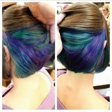 Otherwise they remain hidden unless the hair is styled a certain way or your manes moves or is buffeted by say an unexpected breeze. Super Hair Color Short Mermaid Ideas Peekaboo Hair Peekaboo Hair Colors Short Hair Color