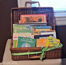 Who will not appreciate a basket full of gifts? Basket Of Books This Is Such A Great Idea For A Baby Shower Gift The Goad Abode A Boston Shower For Baby G Baby Book Gift Book Gift Basket Baby Shower