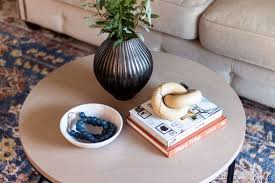 I cut out a round foam piece gluing it down in a few places to keep it from slipping(hobby lobby) and stretched my fabric tight and stapled put a tray down and it can still be a coffee table area, or put your feet up and relax. The Basics Of Coffee Table Styling Shades Of Blue Interiors