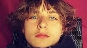 Man grins at detectives after being cleared of murdering stabbed teen