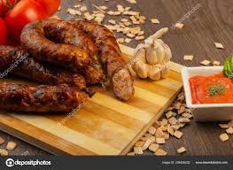 homemade sausage on a wooden background