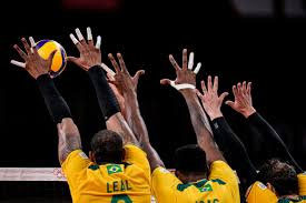 Each team tries to score points by grounding a ball on the other team's court under organized rules. Ur57pbbknyktsm