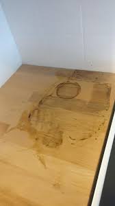 When you leave water standing on a hardwood floor, it seeps through the finish and leaves a white. How To Remove Rotten Vegetable Stains From A Kitchen Table Howto