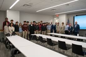 Br. JD's Business classes had an amazing experience visiting Daniel Da  Ponte '96, Founder, Managing Principal, and Senior Financial Advisor at  Axis Wealth Partners, and Kyle Lepley '01, First Vice President and