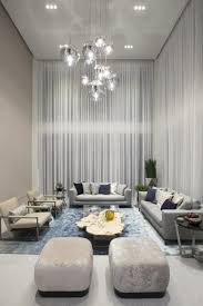 Soaring Proportions Bring A Stately Presence To This Cool Contemporary Living Room Fabric D With Images Miami Interior Design Residential Interior Design Interior Design
