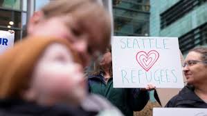 Judge orders Trump administration to admit 12,000 refugees despite halted  program