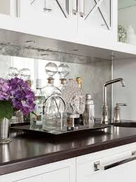 Plain mirror glass is the practical choice, but if you want to create a vintage feel to a room, adding antiqued glass in panels or within a frame, such as in the kitchen above, will create more of. Pin By Lisa Gilmore Design On Home Projects Kitchen Mirror Mirror Backsplash Antique Mirror Backsplash